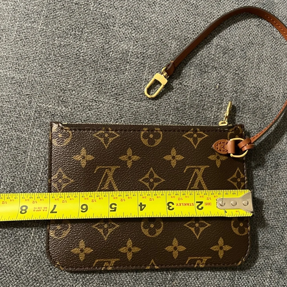 Louis Vuitton monogram zippy pouch wristlet